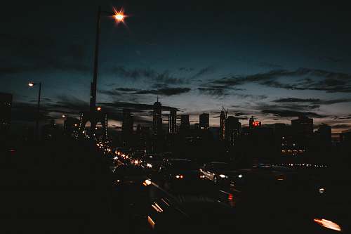 brooklyn bridge photo of busy road near high-rise buildings new york